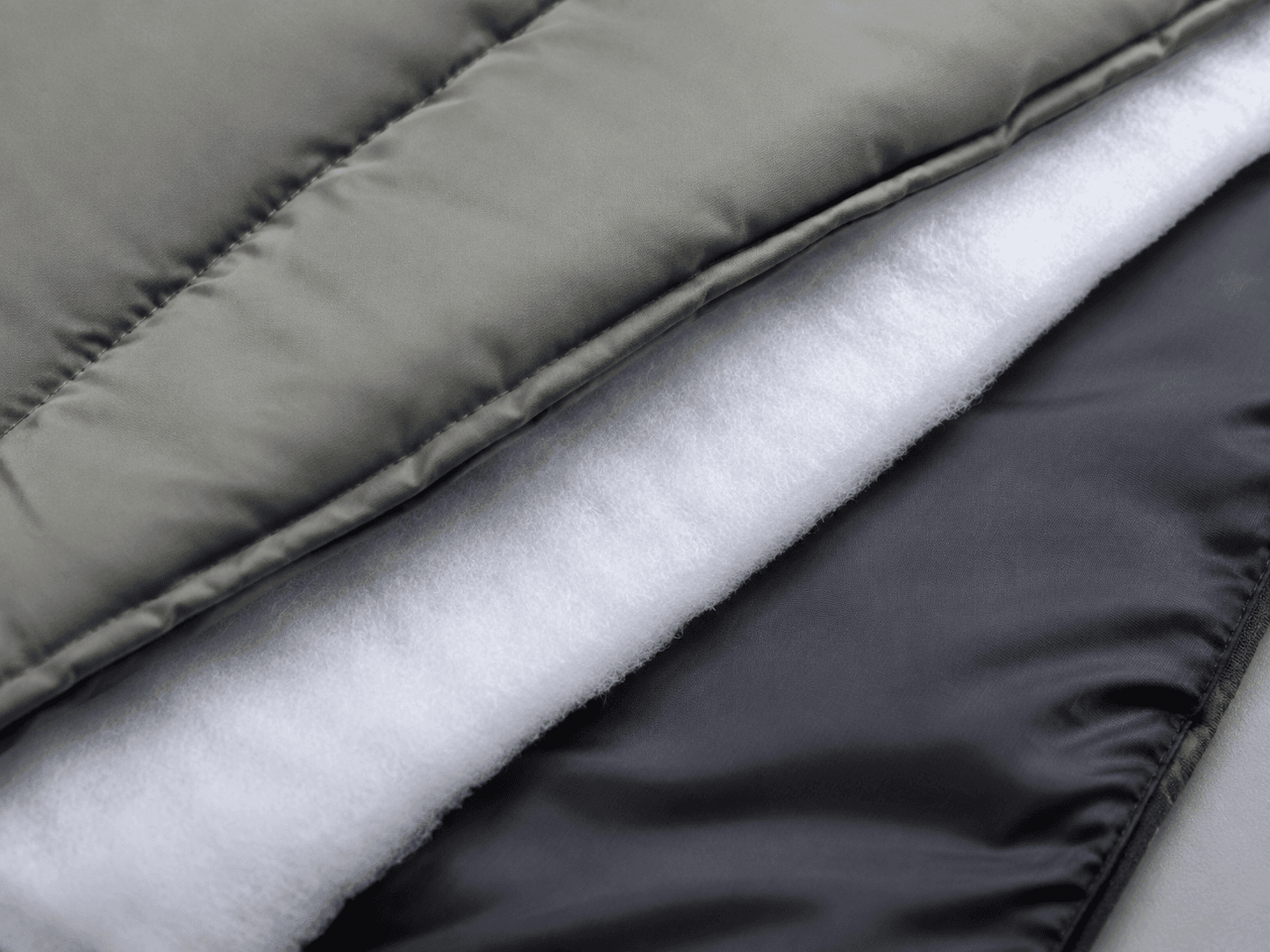 Curved-Panel Stand-Collar Puffer Jacket lining and insulation sourcing direction
